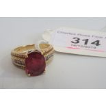 A single stone ruby ring,