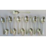 A collection of twelve hallmarked dessert spoons, London 1929, approximately 20 ounces.