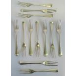 A collection of twelve hallmarked dinner forks, London 1929, approximately 32 ounces.