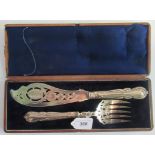 A cased set of silver plated fish servers.