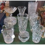 A collection of twelve items of moulded and cut glass, to include: vases, ice pale,