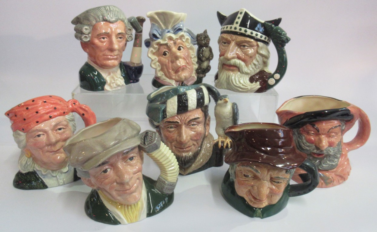 A collection of eight various Royal Doulton character jugs, to include: Apothecary, The Falconer,