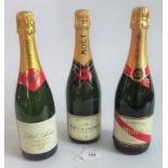 Three bottles of various champagnes, comprising: G H Mumm & Company, Pol Aime and Moet and Chandon,