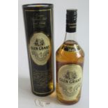 A 1 litre bottle of Glen Grant Highland Malt Scotch Whisky, 43% vol.