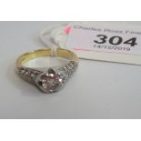 A single stone diamond ring, the brilliant cut diamond in raised mount,
