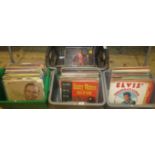 Four boxes containing approximately 100 vinyl LP's, to include: Elvis Presley, Shirley Bassey,