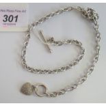 A diamond set heart pendant to an open link 9 carat gold chain, gross weight 13.8g.