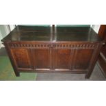A large 19th century oak panelled coffer.