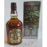 A 1 litre bottle of 12 year old Chivas Regal Premium Scotch Whisky.