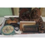 A box containing a quantity of miscellaneous items, to include: a pair of carved wooden bookends,