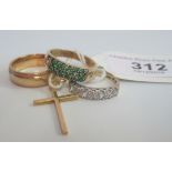 An emerald and diamond half-hoop dress ring, a 9 carat gold wedding band,