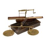 Ø A LATE 18TH/EARLY 19TH CENTURY PURSER'S POCKET BALANCE and 2 guinea balances