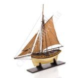 AN ATTRACTIVE LATE 18TH/EARLY 19TH CENTURY SAILING MODEL OF A CUTTER