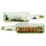 AN HISTORICALLY INTERESTING PAIR OF SHIPS IN BOTTLES MODELLED BY A GERMAN PRISONER ON THE ISLE OF