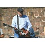 Beatles bassist 1960 Chas Newby signed 12x8 colour photo playing his guitar. Charles Newby is a