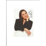 Ricki Lake signed 7x5 - colour image of the presenter, signed in black top right with a smiley face.