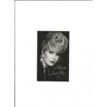 Joanna Lumley 6x4 - black and white image, signed in silver ink by the actress. Good Condition.