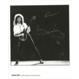 Brian May signed 10x8 - black and white image of the Queen guitarist, signed in silver in silver pen