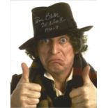 Tom Baker signed 10x8 colour Dr Who photo. Good Condition. All signed pieces come with a Certificate