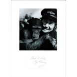 Reg Varney signature piece mounted below b/w photo. Good Condition. All signed pieces come with a.