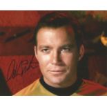 William Shatner signed Star Trek colour photo as Captain James T Kirk. Good Condition. All signed