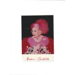 Barbara Cartland signed 7x5; colour image of the author dressed in pink, also signed in pink! Good