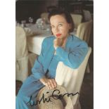 Leslie Caron signed 7x5 colour photo. Good Condition. All signed pieces come with a Certificate of