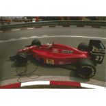 Nigel Mansell signed 12x8 colour photo. Good Condition. All signed pieces come with a Certificate of