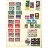 Worldwide stamp valuable collection in brown stock book from countries including GB, Hong Kong,