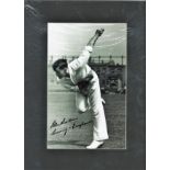 Cricket Alec Bedser signed 16x12 overall mounted b/w photo pictured bowling at the Oval. Sir Alec