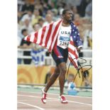 Athletics Justin Gatlin Signed Athletics 8x12 Photo. Good Condition. All signed pieces come with a