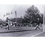 Autographed 16 x 12 photo, STEVE CHALMERS 1967, a superb image depicting the Celtic player turning