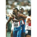 Athletics Kris Akabusi Signed 1991 Tokyo 8x12 Photo. Good Condition. All signed pieces come with a
