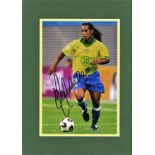 Football Ronaldinho signed 16x12 overall mounted colour photo. Ronaldo de Assis Moreira, born 21