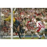 Football David Seaman 12x8 signed colour photo pictured in action for Arsenal FC. Good Condition.