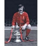 Autographed 16 x 12 photo, TOMMY SMITH 1974, a superb image depicting the Liverpool right-back