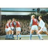 Football Martin Peters 8x12 signed colour photo pictured in action for West Ham. Good Condition. All