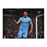 Football Sergio Aguero 16x12 signed colour photo pictured celebrating after scoring for Manchester