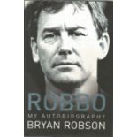 Bryan Robson hardback book titled Robbo my autobiography signature piece attached to inside title