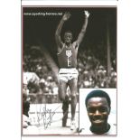 Olympics Ralph Boston 6x4 signed b/w photo, American long jumper who won medals at three consecutive