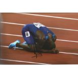 Athletics Justin Gatlin 8x12 signed colour photo. Justin Gatlin, born February 10, 1982 is an