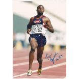 Athletics Tim Montgomery Signed Athletics 8x12 Photo. Good Condition. All signed pieces come with