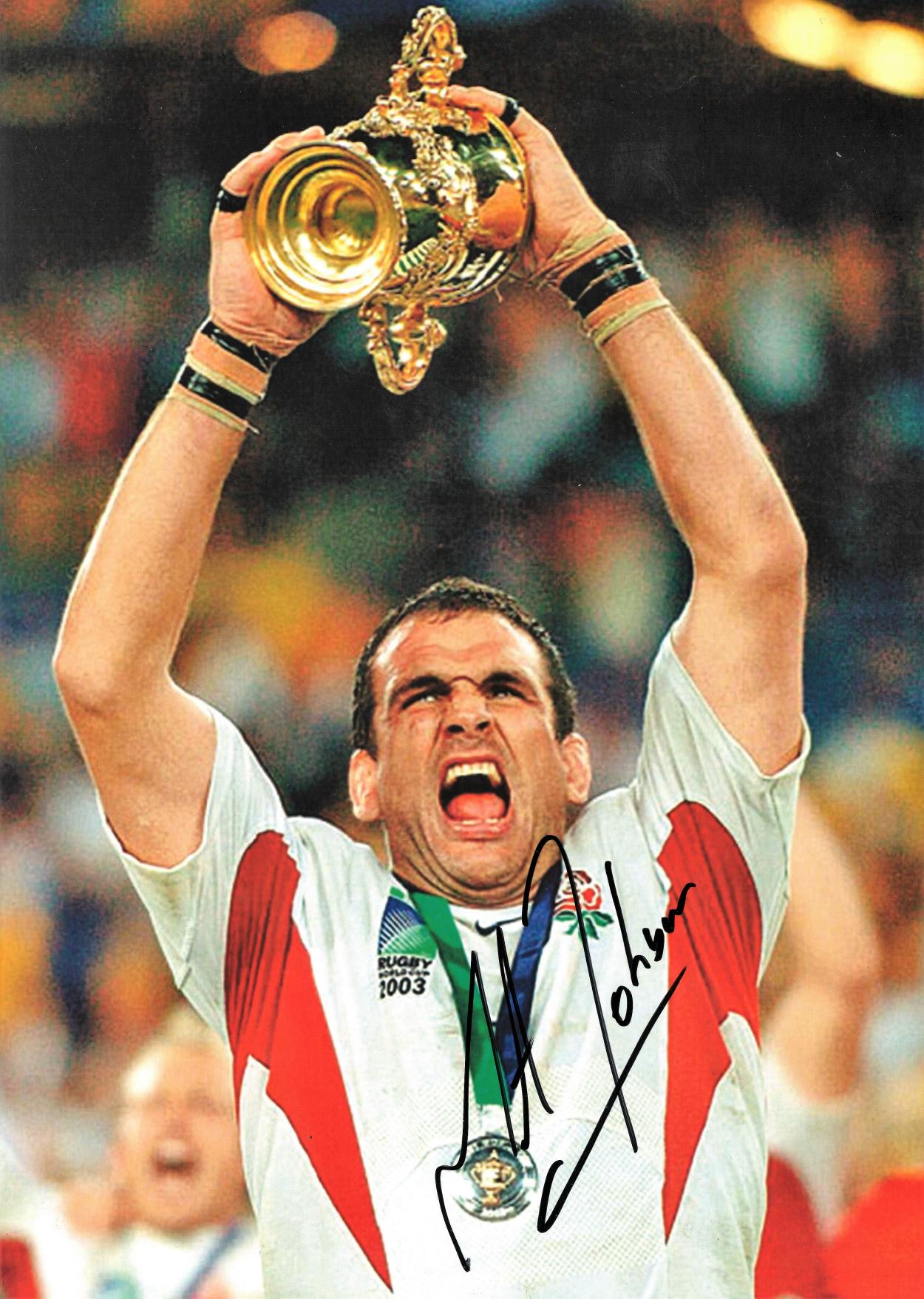Rugby Union Martin Johnson 16x12 signed colour photo pictured lifting the Webb Ellis trophy after
