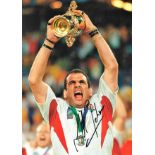 Rugby Union Martin Johnson 16x12 signed colour photo pictured lifting the Webb Ellis trophy after