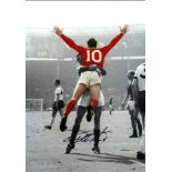 Football Geoff Hurst 16x12 signed colour enhanced photo pictured celebrating after scoring in the