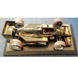 Motor Racing Ayrton Sennas 1985 Lotus John Player Special 97T Formula One scale model. The Lotus 97T