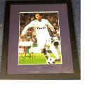 Football Mesut Özil 18x14 approx framed and mounted signed colour photo pictured in action for