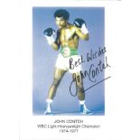 John Conteh Signed Boxing 8x12 Photo. Good Condition. All signed pieces come with a Certificate of