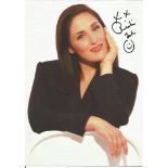 Ricki Lake signed 7x5 - colour image of the presenter, signed in black top right with a smiley face.