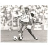 Phil Neal Signed 1982 England 8 x 10 inch Press Photo. Good Condition. All signed pieces come with a